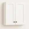Wall-mounted double-door cabinet in white finish, featuring minimalist design and brushed metal knobs, representing high-quality RTI cabinetry solutions for home renovation projects.