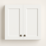 Over the fridge cabinet in white shaker style with double doors and round knobs, ideal for maximizing kitchen storage solutions.