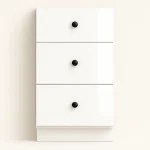 Three-drawer white cabinet with black knobs, showcasing Ready-to-Install (RTI) cabinetry features for renovation projects.